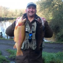 Dave Minal with a gorgeous Golden trout and a terrific Tiger.