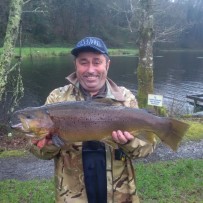 Adrian Kruger with a monster 10lb Brown trout.