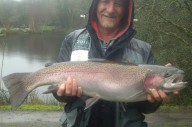 Paul Woodmore with a fin perfect Rainbow just under 12lbs.